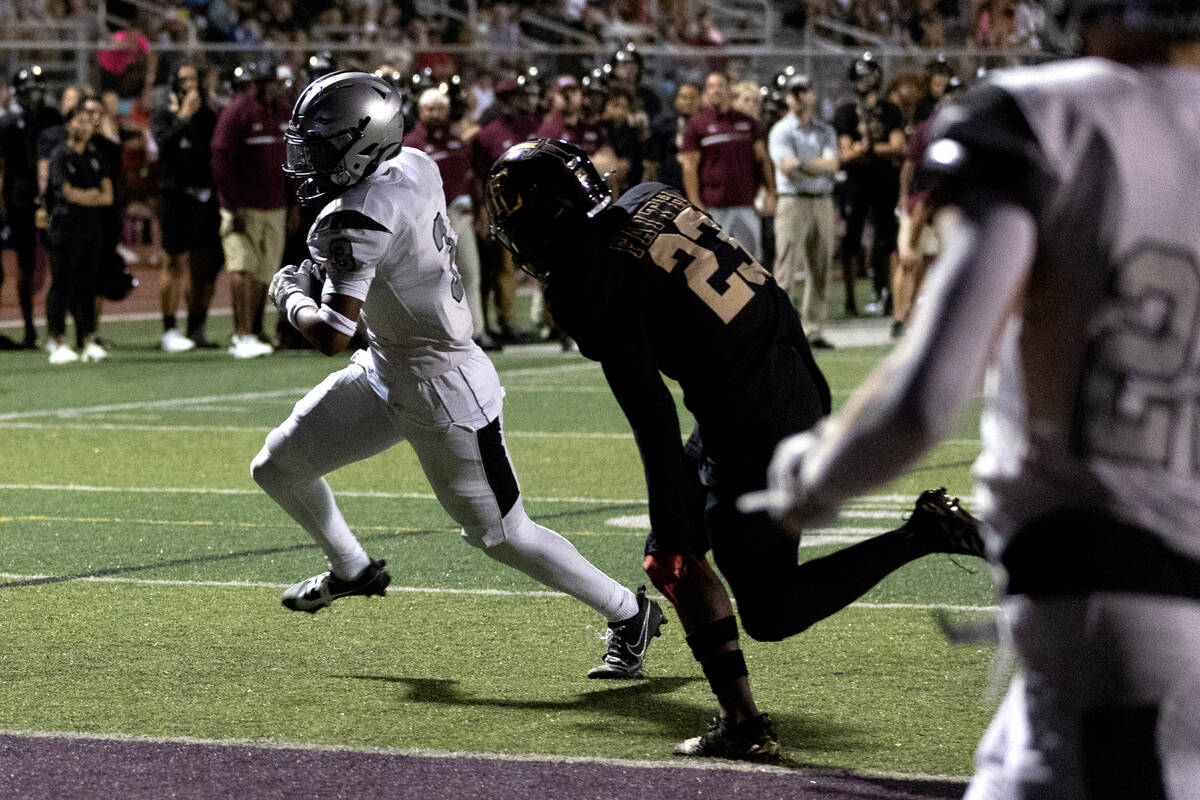 Palo Verde’s Jevon Padilla (3) is about to score a touchdown while Faith Lutheran’ ...