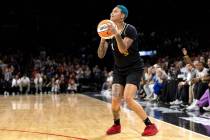 Las Vegas Aces guard Kierstan Bell (1) shoots while the New York Liberty leave her open during ...