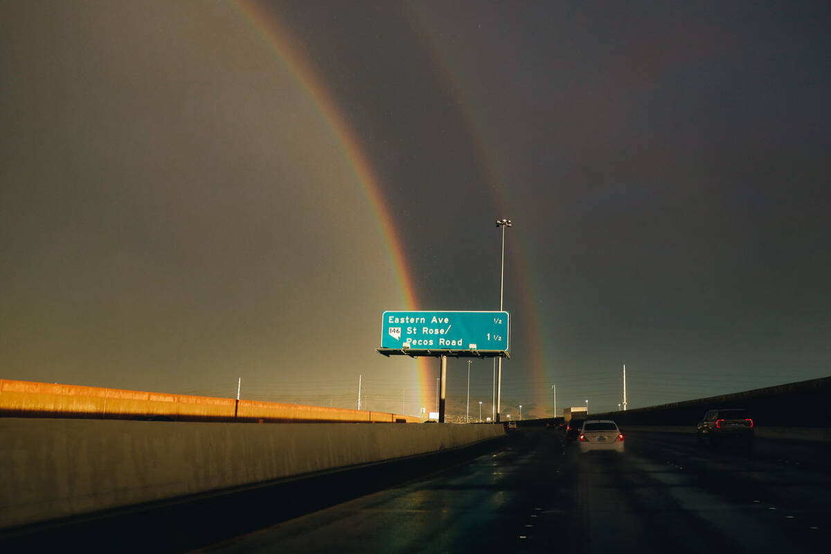 A double rainbow is seen on Nevada State Route 146 during rainfall on Friday, Aug. 18, 2023, in ...