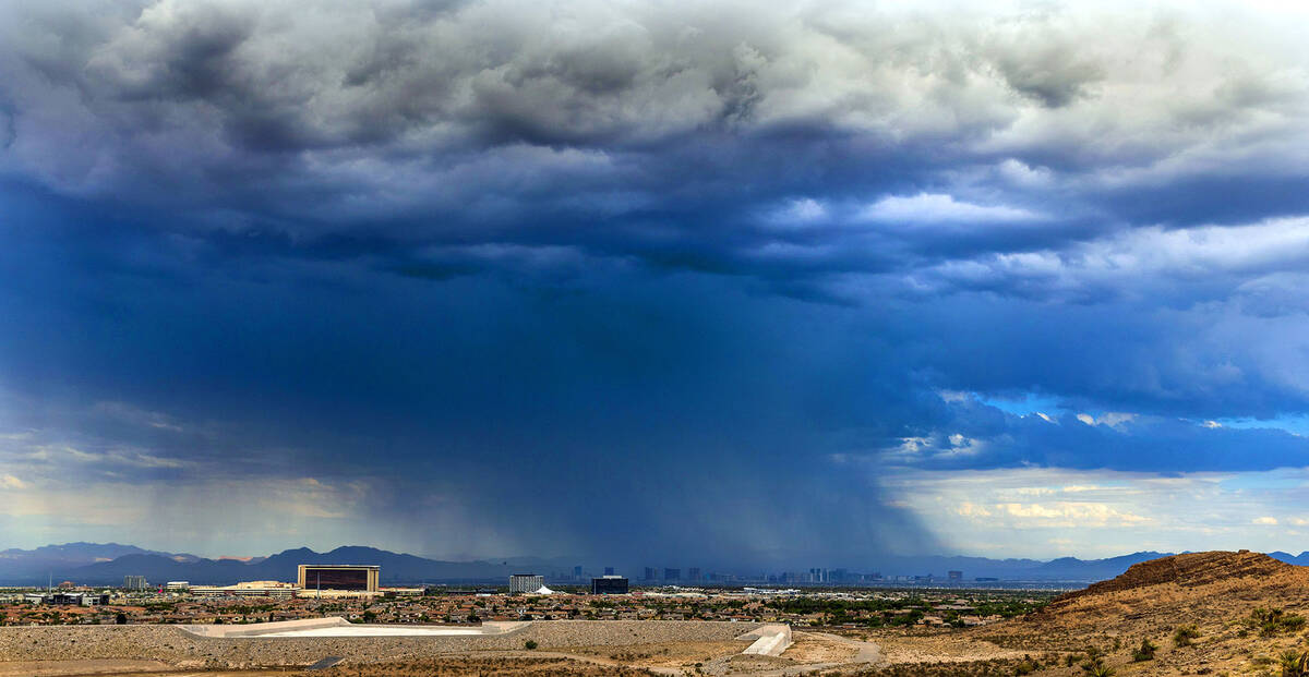 Storms move across the area and dump lots of rain about the central part of the city on Friday, ...