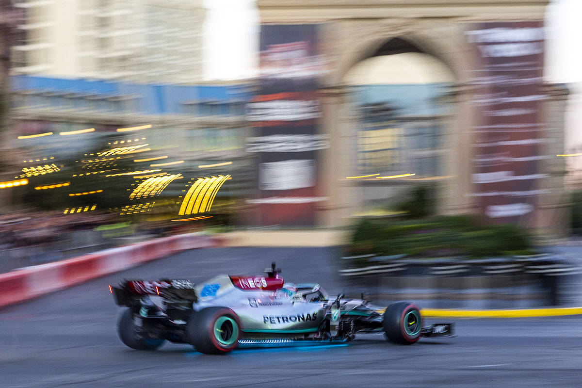 Racer George Russell turns into the Paris while racing down the Strip during the Formula One La ...