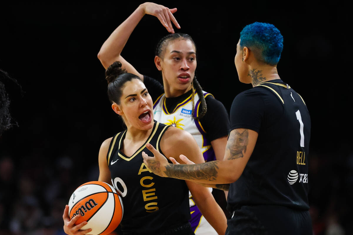 Las Vegas Aces guard Kelsey Plum (10) hypes up Las Vegas Aces guard Kierstan Bell (1) while for ...