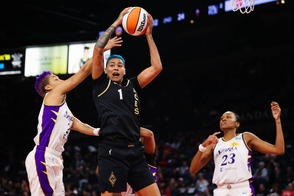 Las Vegas Aces guard Kierstan Bell (1) rebounds the ball during a WNBA game against the Los Ang ...