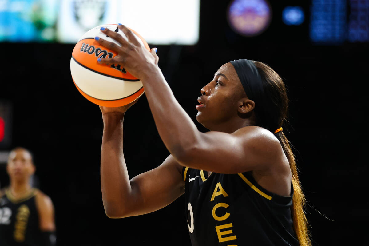 Las Vegas Aces guard Jackie Young (0) shoots a three pointer during a WNBA game against the Los ...