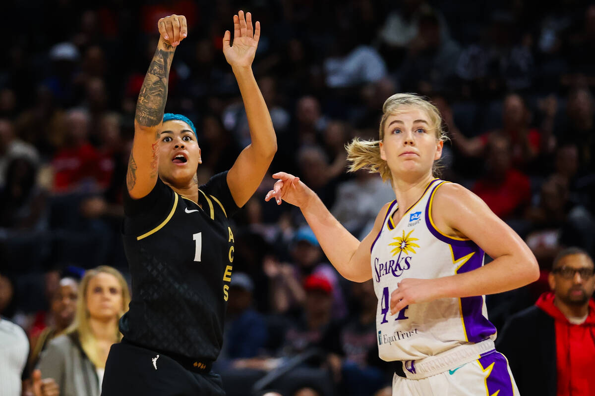 Las Vegas Aces guard Kierstan Bell (1) shoots a three pointer during a WNBA game against the Lo ...