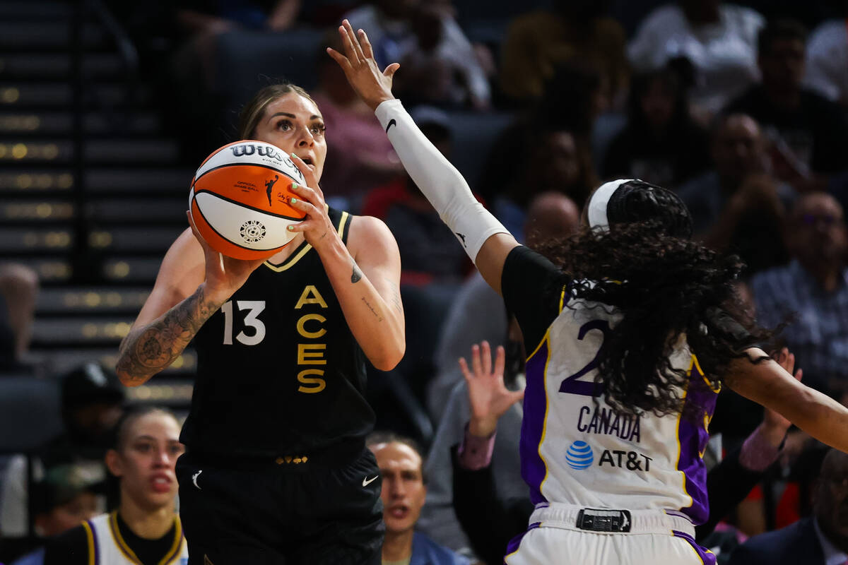 Las Vegas Aces forward Cayla George (13) prepares to shoot a three pointer during a WNBA game a ...