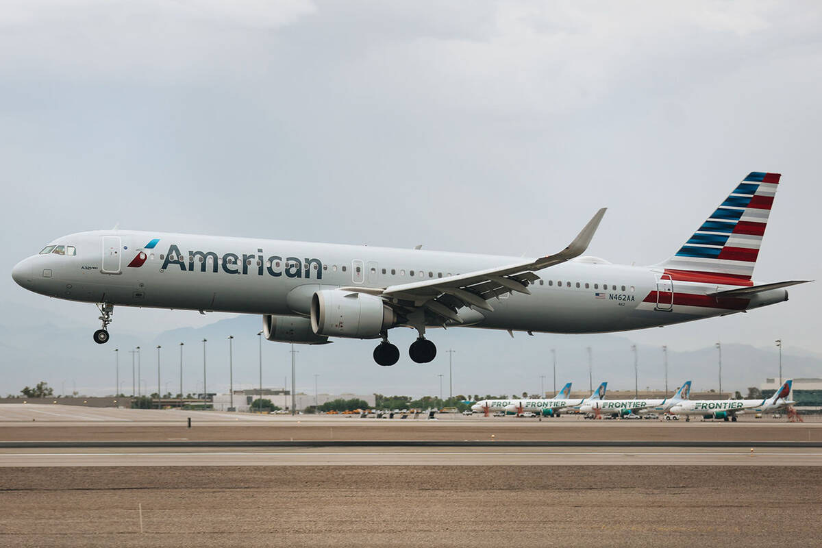 An airplane flies into Harry Reid International Airport on Saturday, August 19, 2023, in Las Ve ...