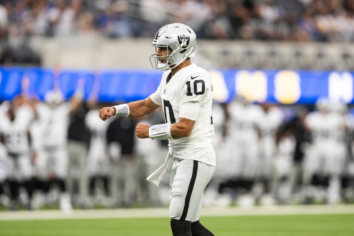 Las Vegas Raiders quarterback Jimmy Garoppolo (10) reacts on the team's touchdown during an NFL ...
