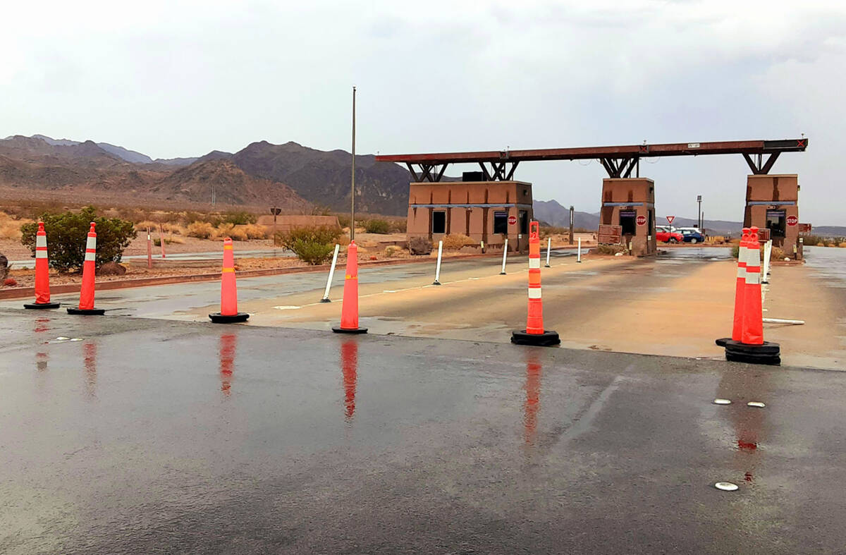 Orange pylons block one of the main entrances to Lake Mead National Recreation area after park ...