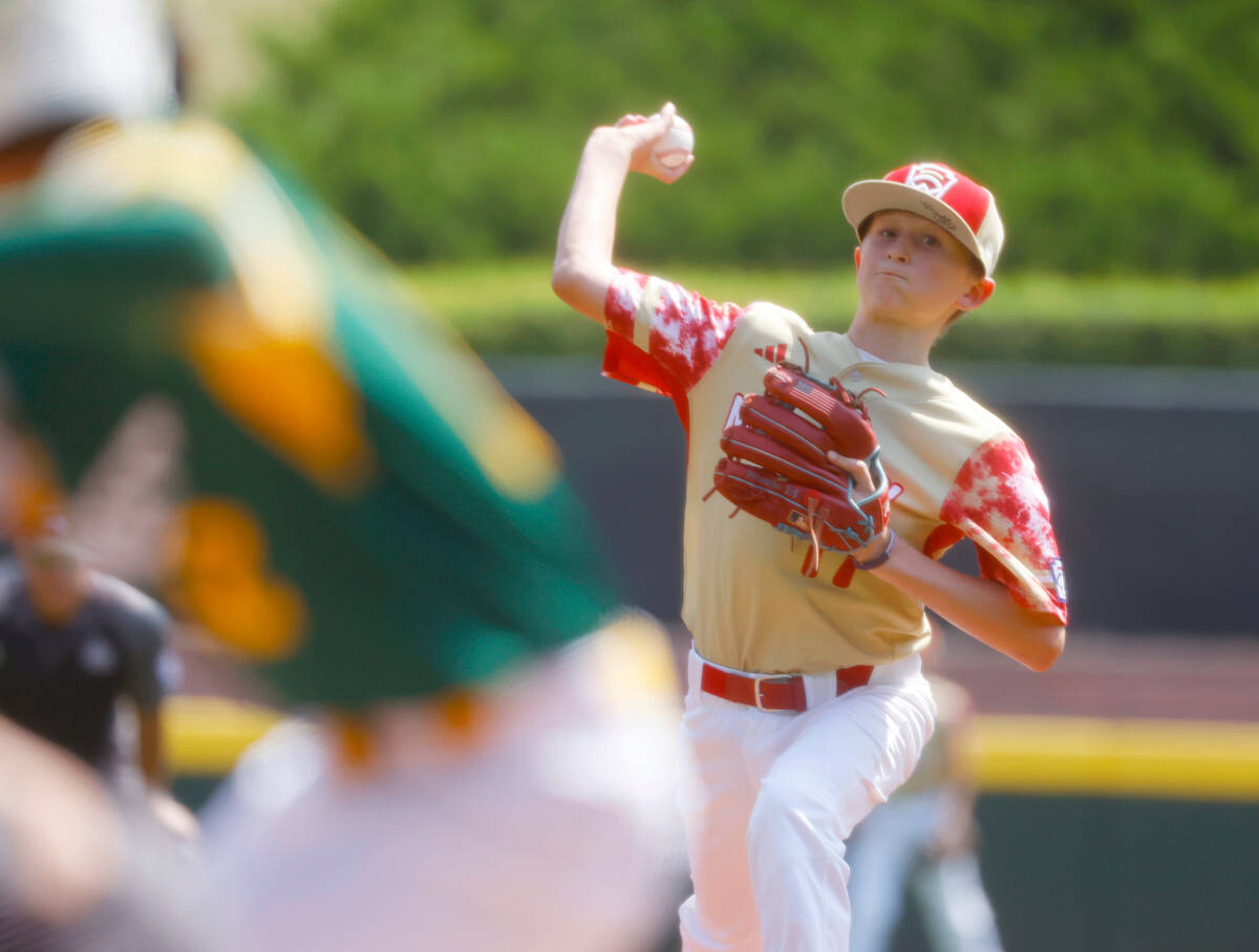 The Henderson All-Stars pitcher Jaxson McMullin delivers a pitch against Fargo, North Dakota, d ...