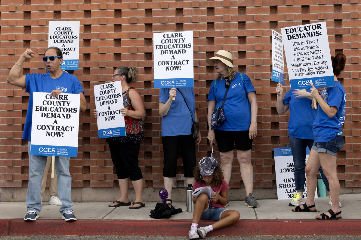 Clark County Education Association teachers union members protest outside CCSD’s Greer E ...