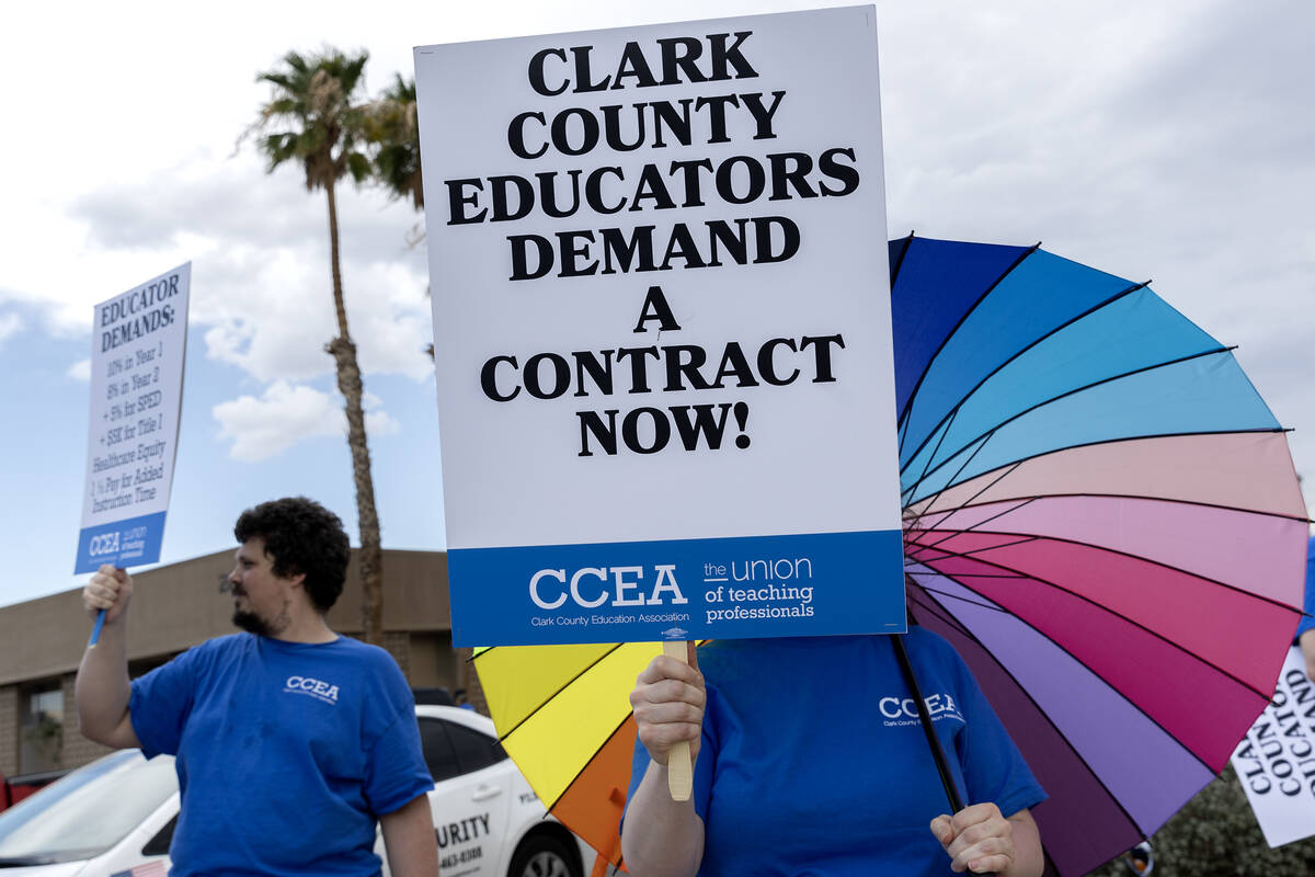 Clark County Education Association teachers union members protest outside CCSD’s Greer E ...