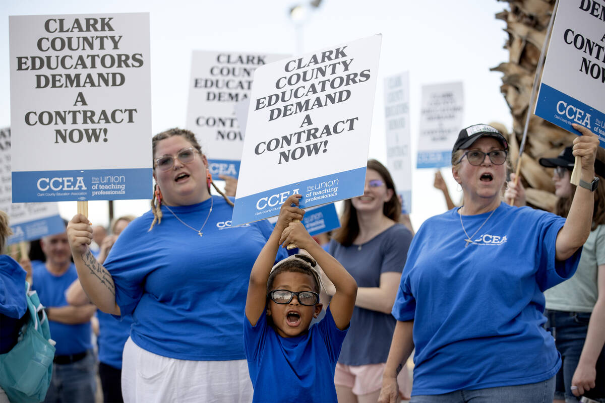 Megan Blanz, left, an art teacher at Matt Kelly Elementary School, her son Enzo, 6, and her mot ...