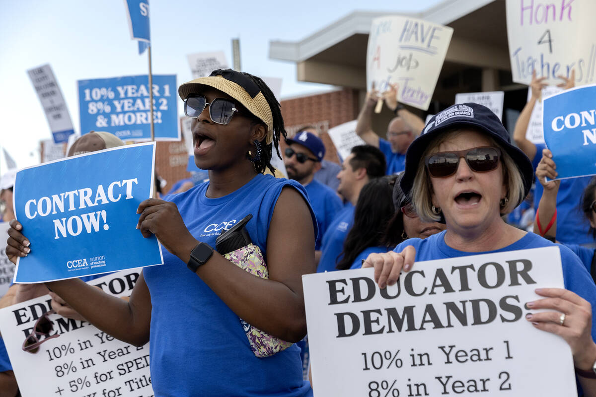 Linda Massena-Noel, left, and Andrea Hernandez, right, who both work at Gragson Elementary Scho ...