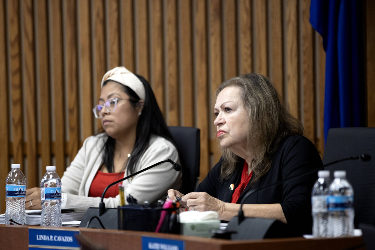 CCSD Trustee Linda Cavazos, right listens to public comment during a school board meeting at th ...