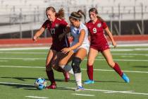 Foothill’s Izzy Simoneau (6) and Desert Oasis’ Hayleigh Olson (17) go head to head during ...