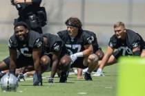 Raiders linebacker Drake Thomas (57) stretches during their mandatory minicamp at the Intermoun ...