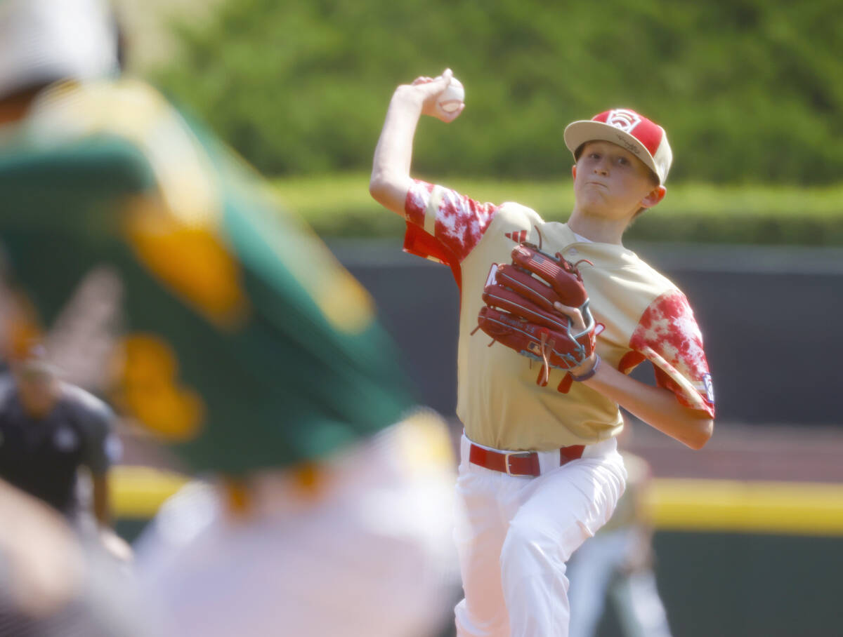 The Henderson All-Stars pitcher Jaxson McMullin delivers a pitch against Fargo, North Dakota, d ...