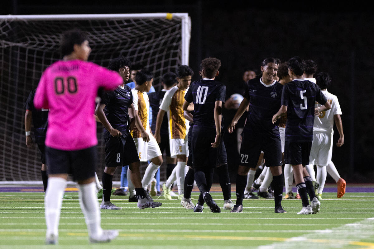 Sunrise Mountain gathers to celebrate their win over Eldorado during a high school soccer game ...