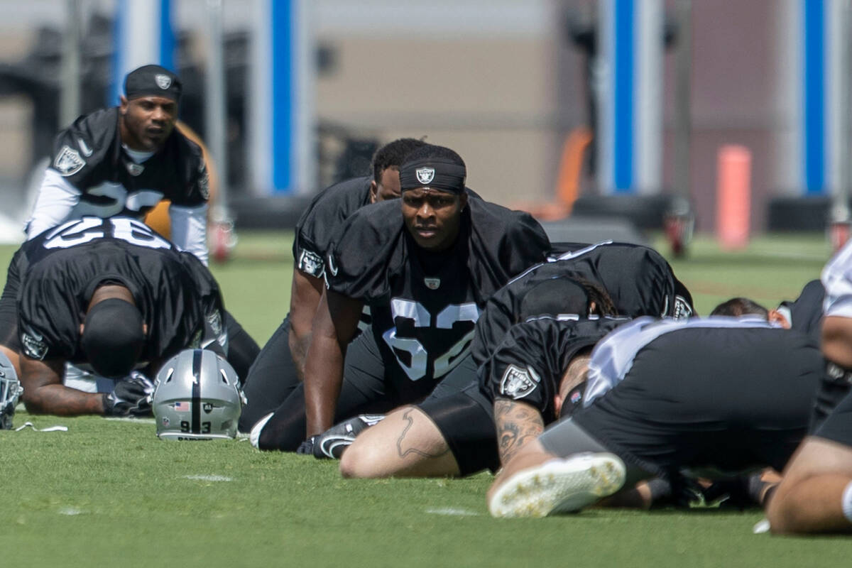 Raiders defensive end David Agoha (62) stretches during the team’s mandatory minicamp at the ...