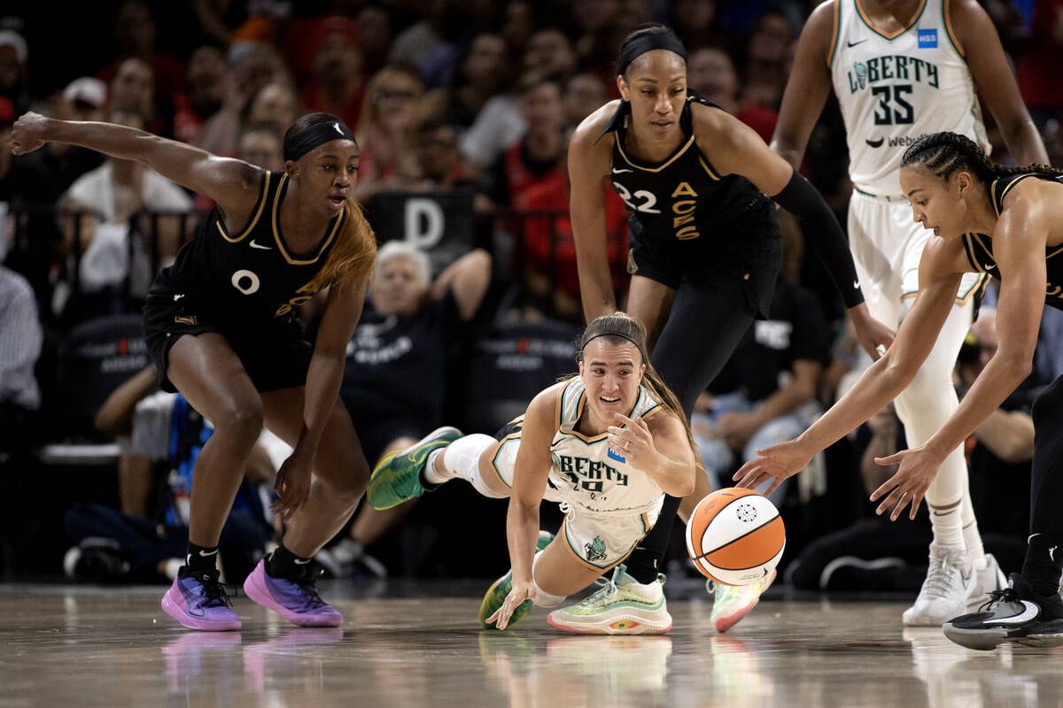 New York Liberty guard Sabrina Ionescu dives for the ball during a WNBA Commissioner’s Cup ga ...