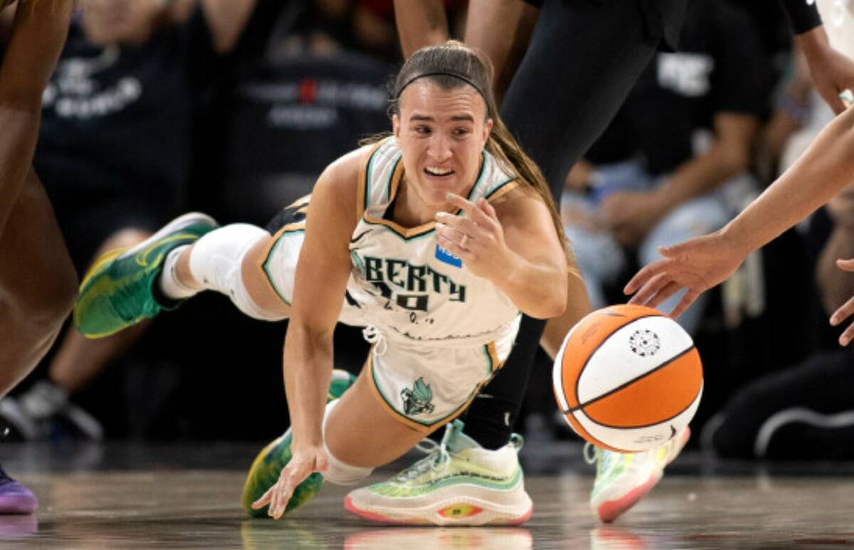 New York Liberty guard Sabrina Ionescu wears her green and yellow Sabrina 1 model Nike brand sh ...