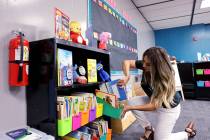 Kindergarten teacher Jennifer Saucedo sets up her classroom at Ronnow Elementary School in Las ...