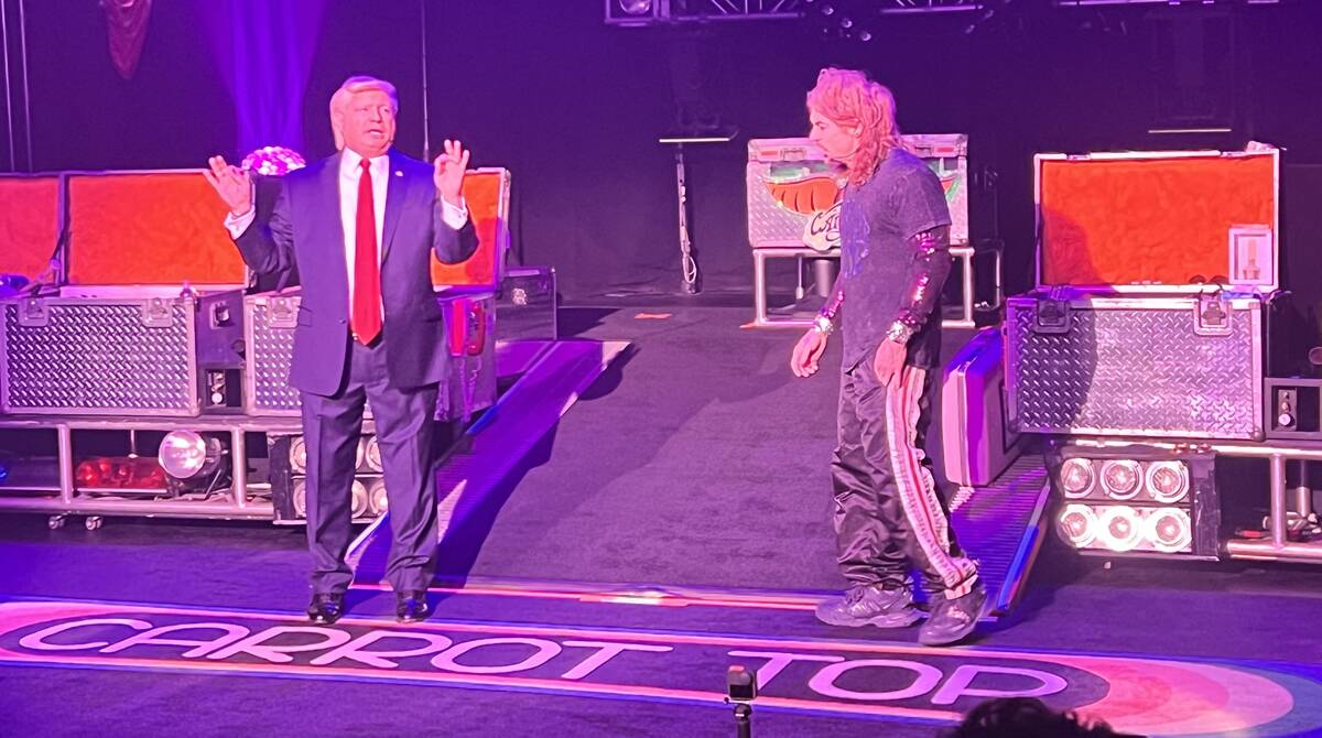 John Di Domenico as Donald Trump is shown with Carrot Top at Luxor's Atrium Showroom on Monday, ...