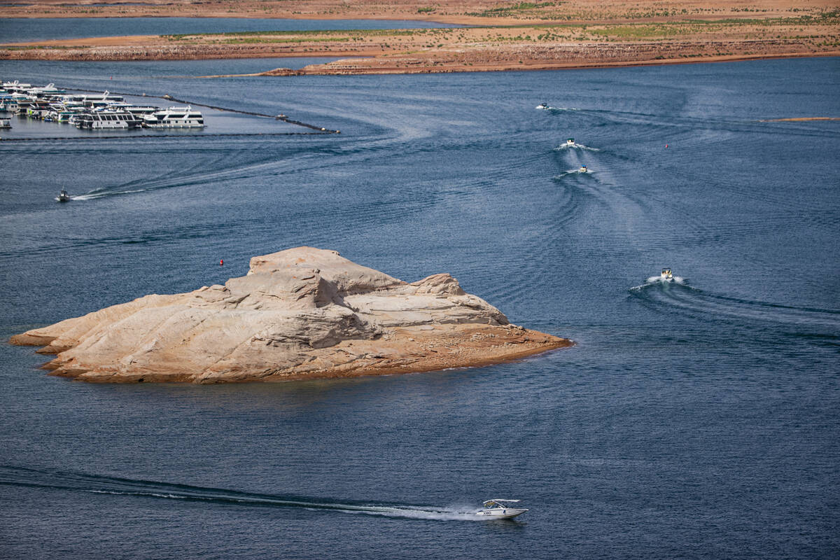 Boats and other watercraft are pictured near the Wahweap Marina at Lake Powell in the Glen Cany ...