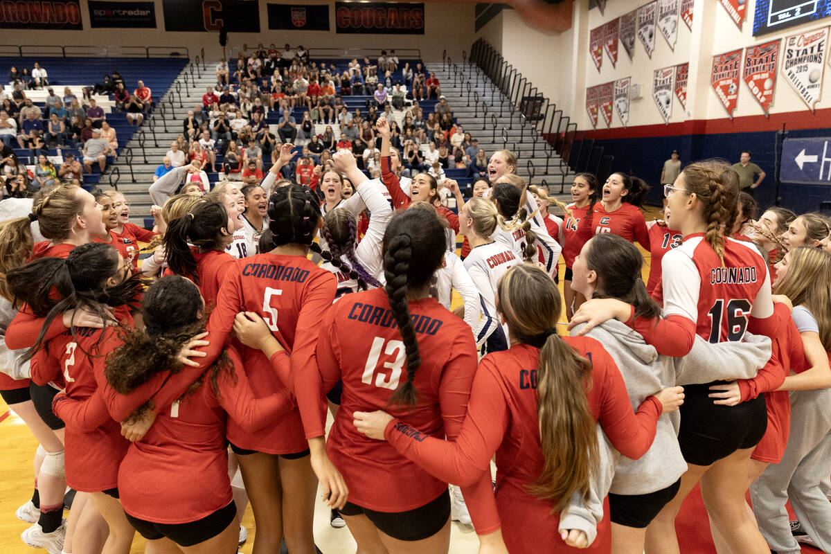 Coronado cheers before beginning their a high school volleyball game against Silverado at Coron ...