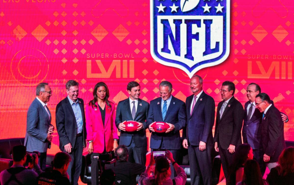 Invited dignitaries come together during a Super Bowl press conference at Vu Las Vegas on Wedne ...