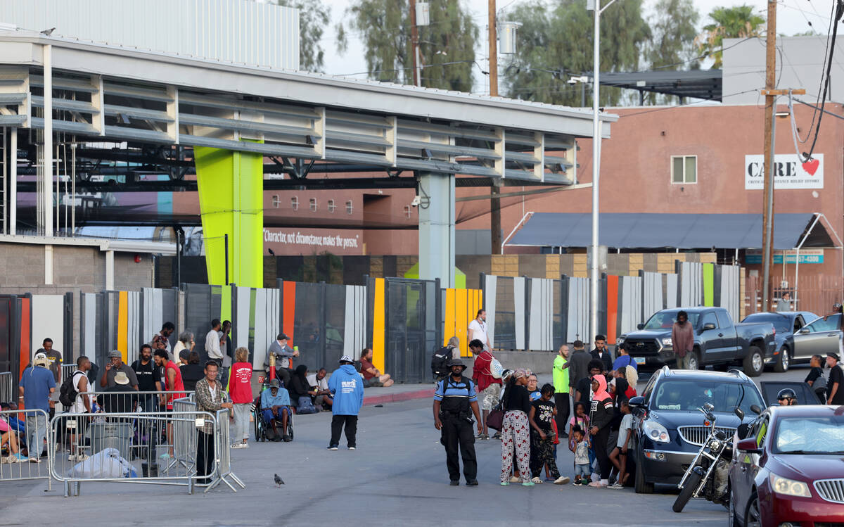 People congregate on Foremaster Lane between Las Vegas Boulevard and Main Street near the Court ...