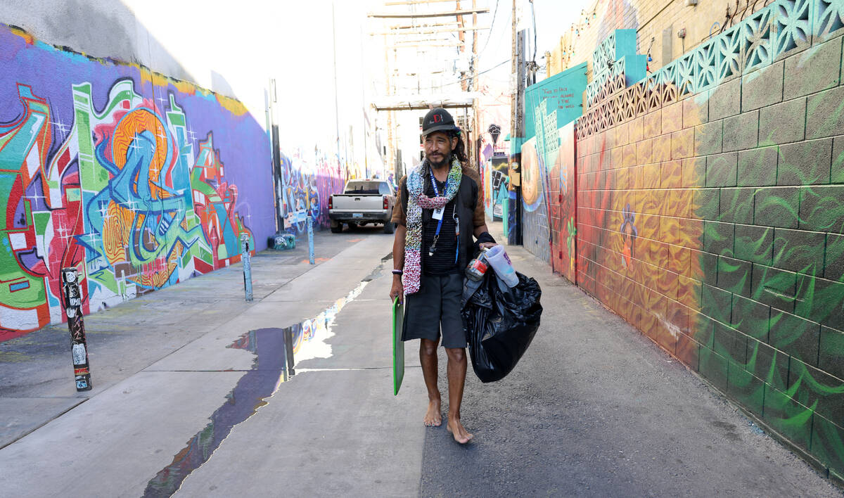 Beau Fletcher, 47, who said he is homeless, walks in an alley near Las Vegas Boulevard and Frem ...