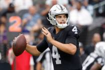 Raiders quarterback Aidan O'Connell (4) throws a pass during the second half of an NFL preseaso ...