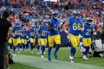 Los Angeles Rams take the gridiron in the first half of an NFL preseason football game Saturday ...