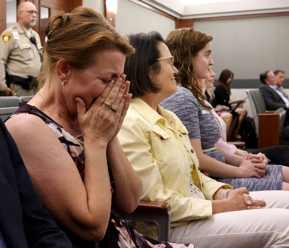 Colleen Beyer, daughter of murder victim Sharon Causse Randolph, reacts in court at the Regiona ...