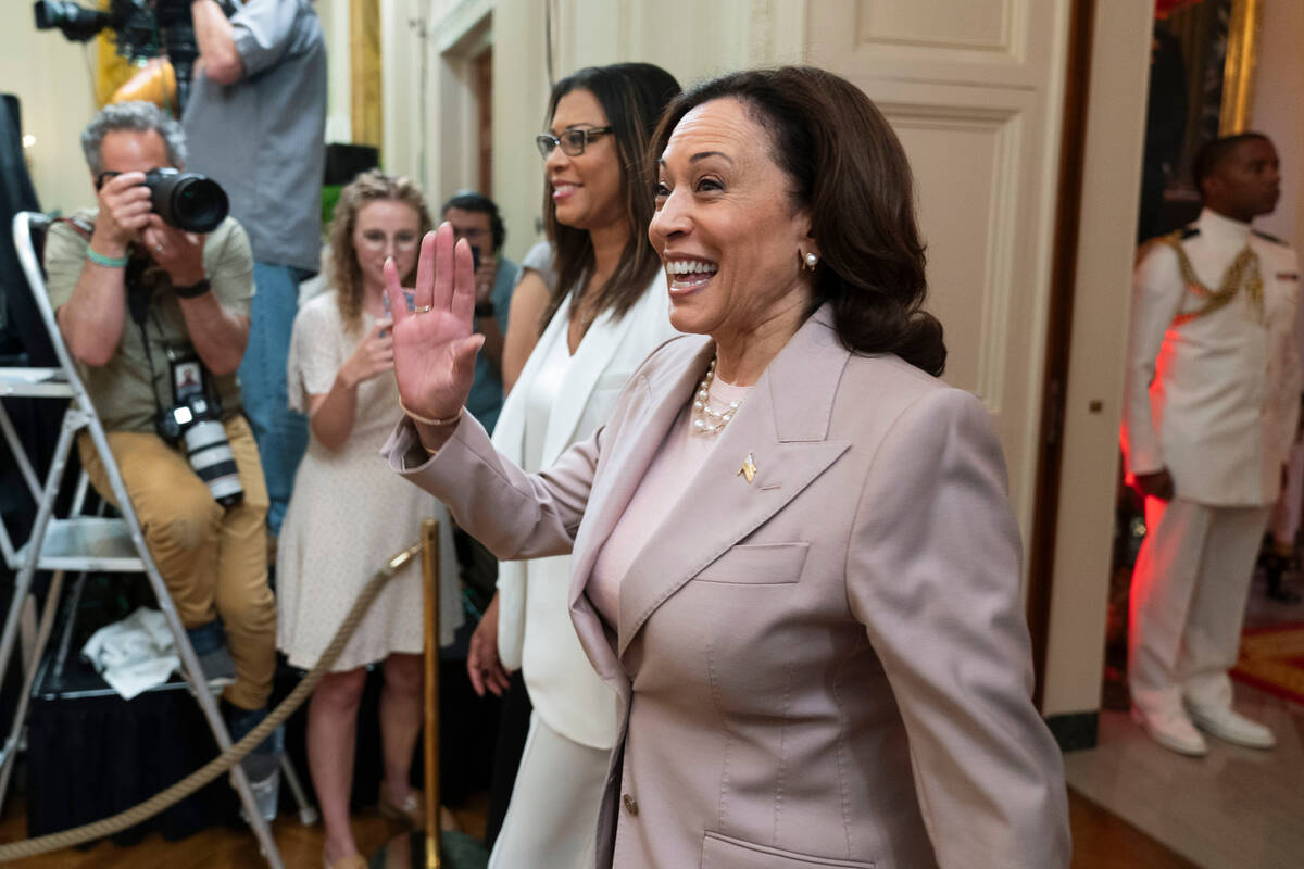 Vice President Kamala Harris, arrives in the East Room with Las Vegas Aces president Nikki Farg ...