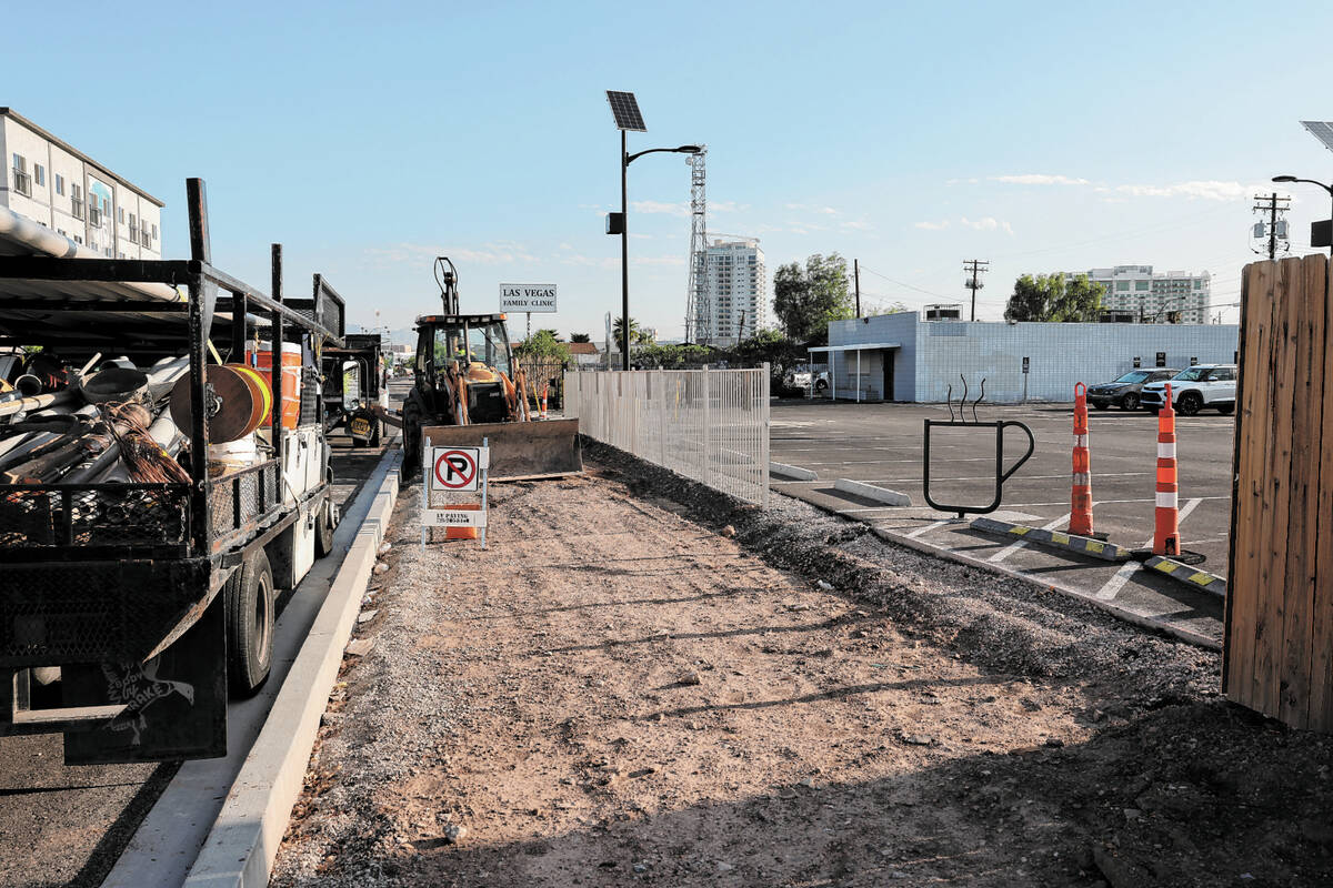 A coffee mug bike rack is seen as work continues on Casino Center Boulevard near Dig It Coffee ...