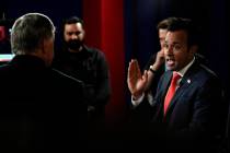 Businessman Vivek Ramaswamy talks with Sean Hannity in the spin room after a Republican preside ...