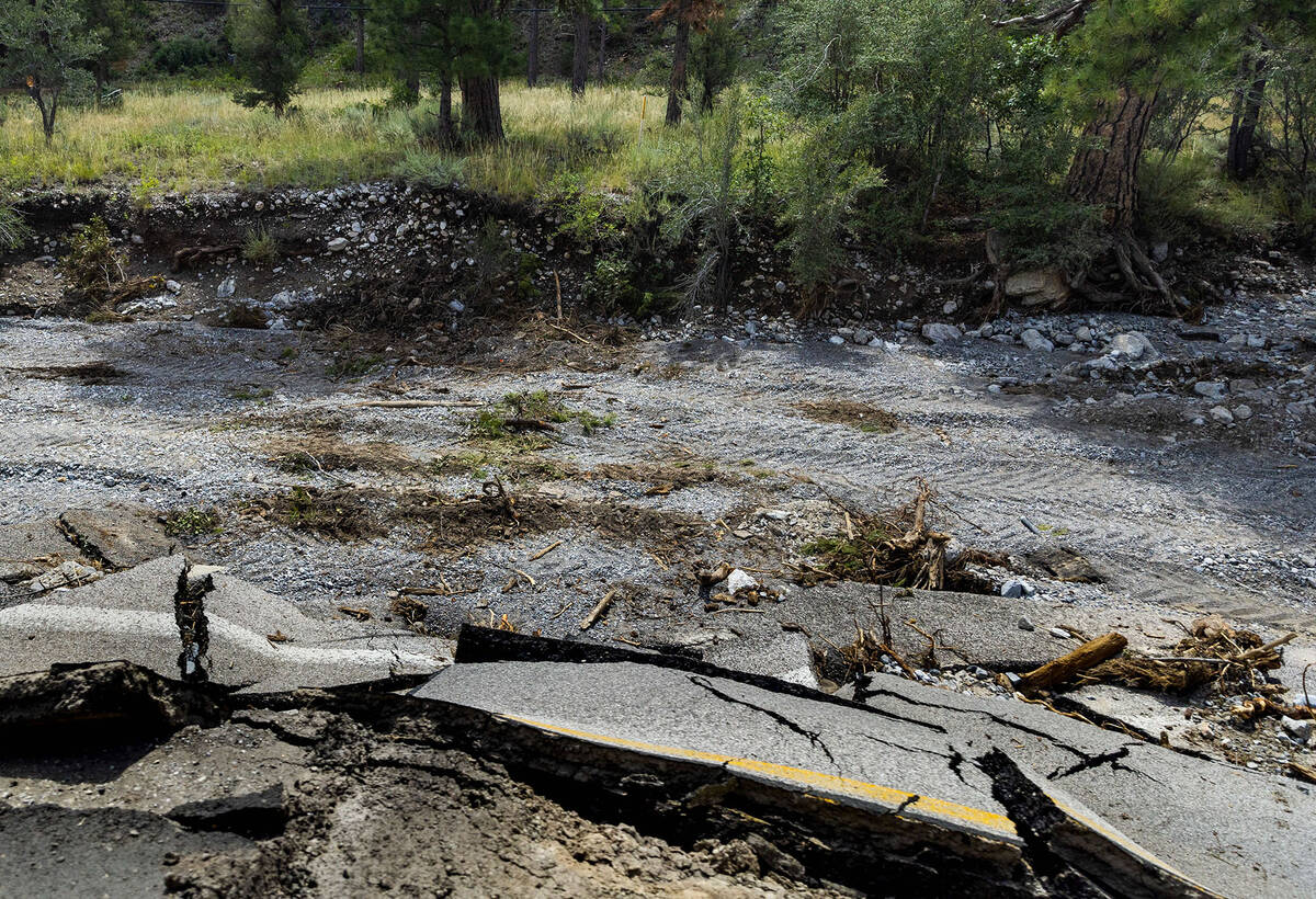 Sections of Kyle Canyon Road are crumbled or washed away needing repair as cleanup from the ext ...