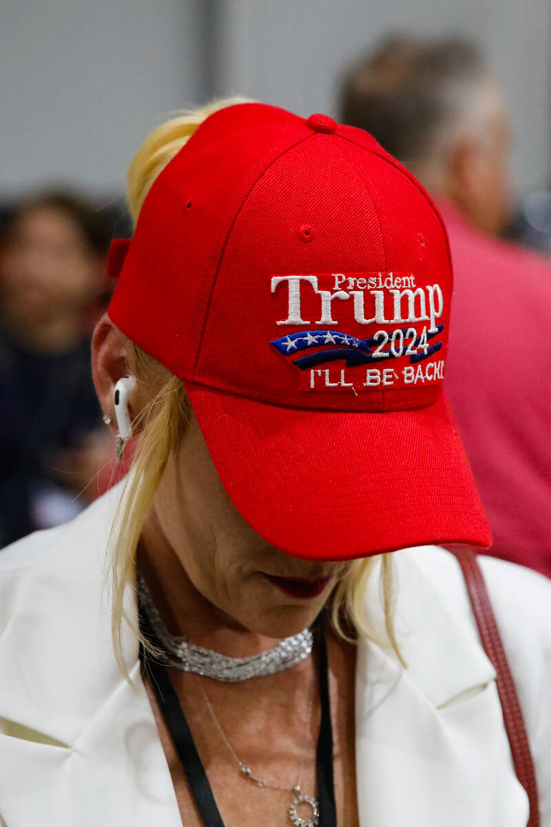 A woman sports a Trump 2024 hat at the ReAwaken America Tour on Friday, Aug. 25, 2023, at Craig ...