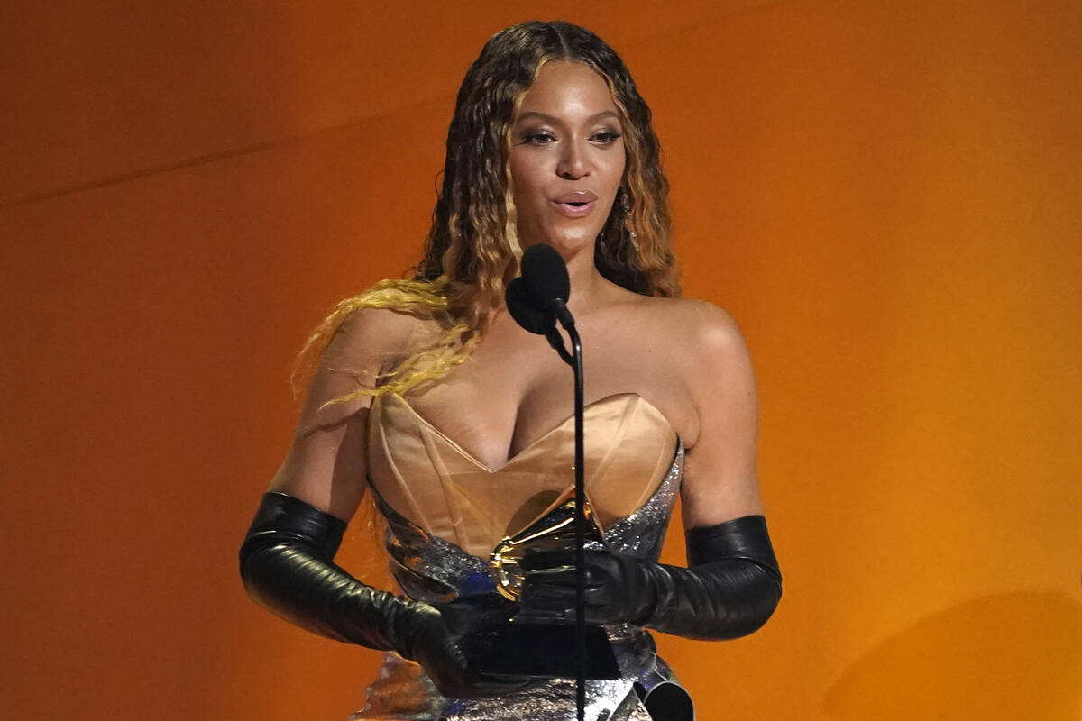 FILE - Beyonce accepts the award for best dance/electronic music album for "Renaissance" at the ...