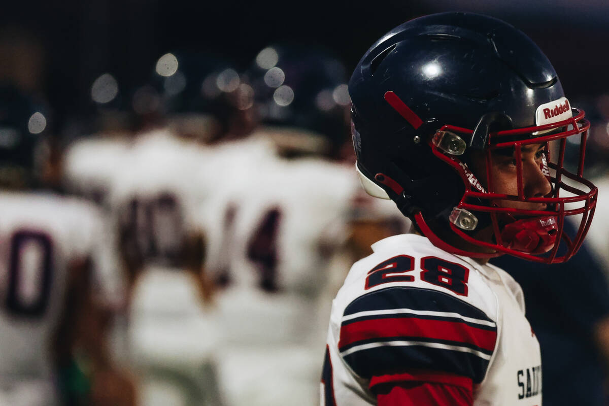 A St. Louis player watches his team from the sidelines during an Island Classic game against Li ...