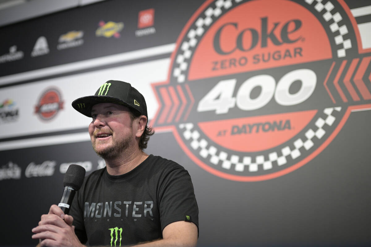 Kurt Busch answers questions from reporters after announcing his retirement before a NASCAR Cup ...