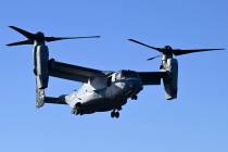A MV-22B Osprey is seen coming in to land on the USS America off the coast of Brisbane, Tuesday ...
