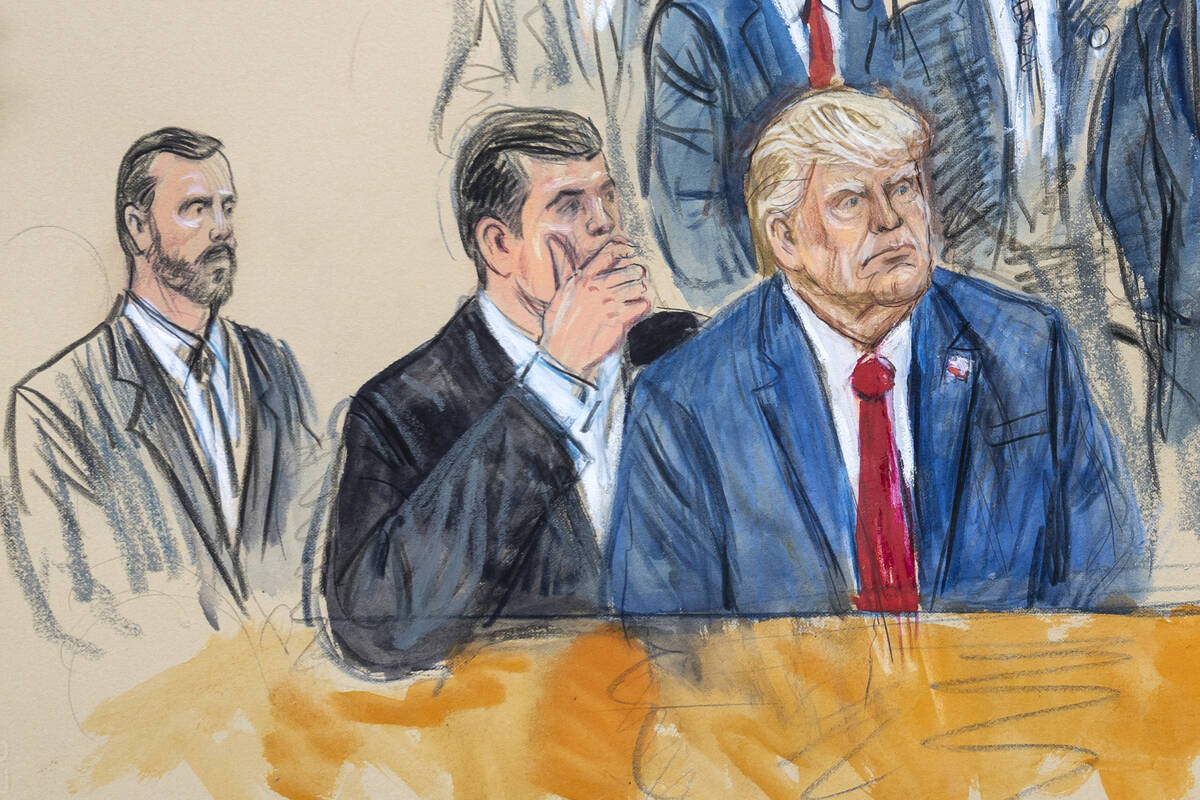 FILE - This artist sketch depicts former President Donald Trump, right, conferring with defense ...