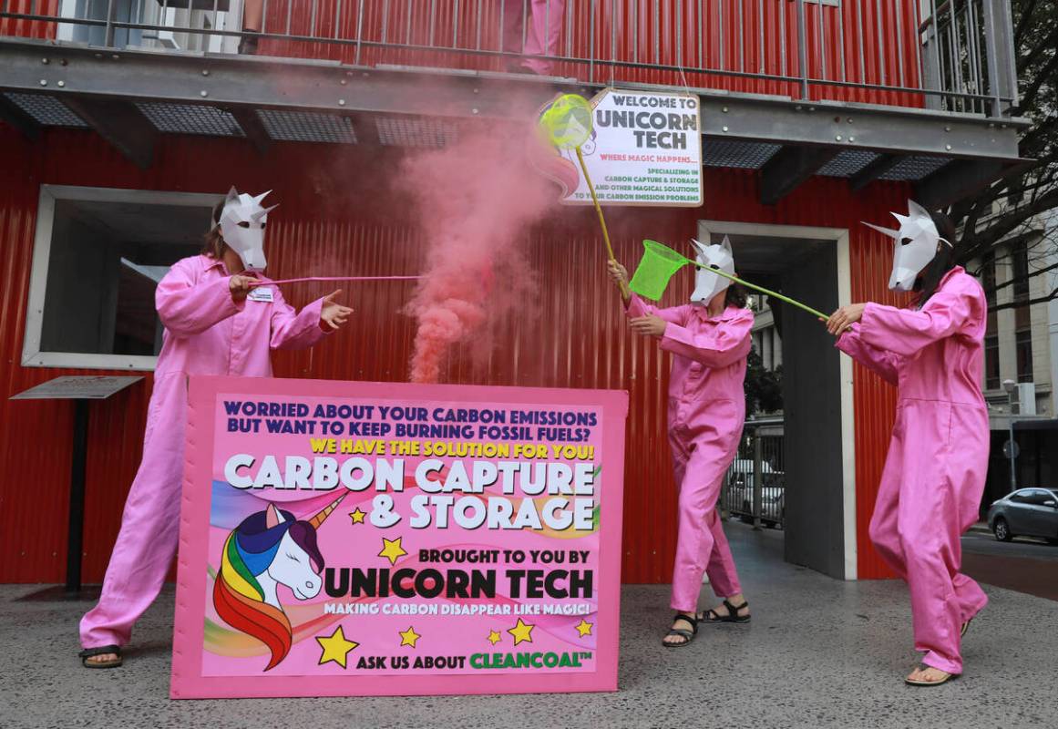 Members of Extinction Rebellion stage a protest in Cape Town, South Africa, Friday, Nov. 11, 20 ...