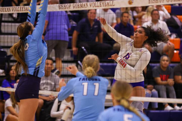 Bishop Gorman’s Aliitasi Fakatoumafi (13) spikes the ball during a volleyball game betwe ...