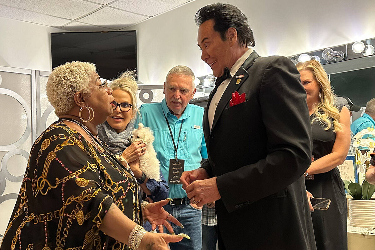 Wayne Newton is shown with headlining comic Luenell after his show at Flamingo on Saturday, Jun ...