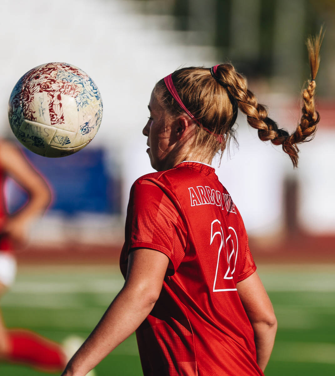 Arbor View soccer player Dakota Larkin comes face to face with the ball during a game against C ...